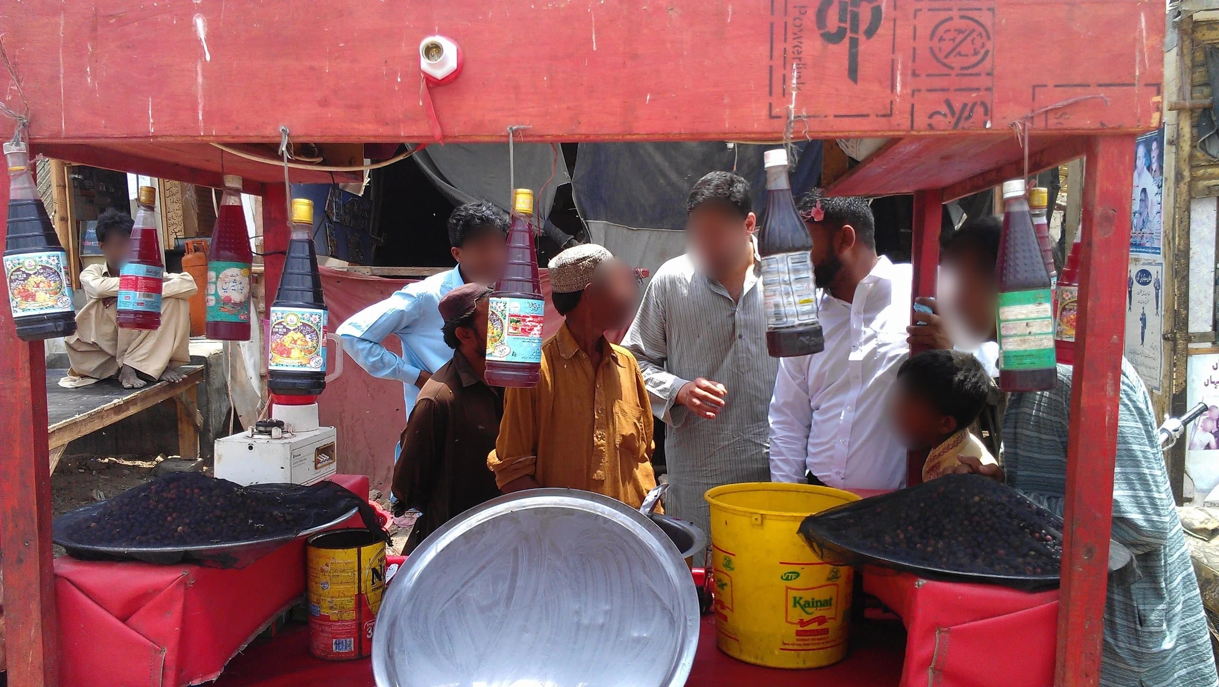 A mini-MBA session in Bilal Colony, Karachi, faces blurred for privacy