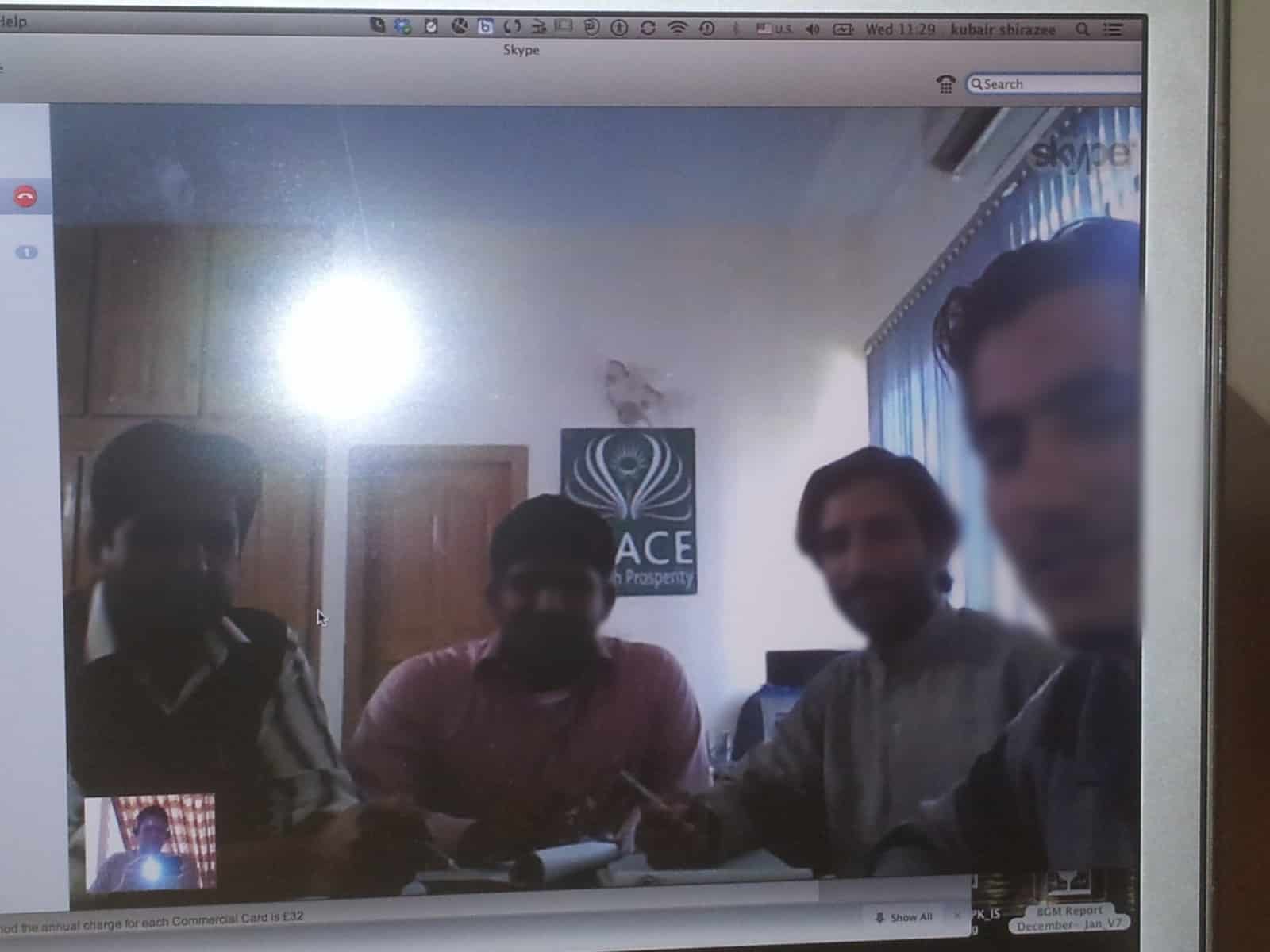 The Peace Through Prosperity team on a video call with a guest speaker, 2013. Faces blurred.