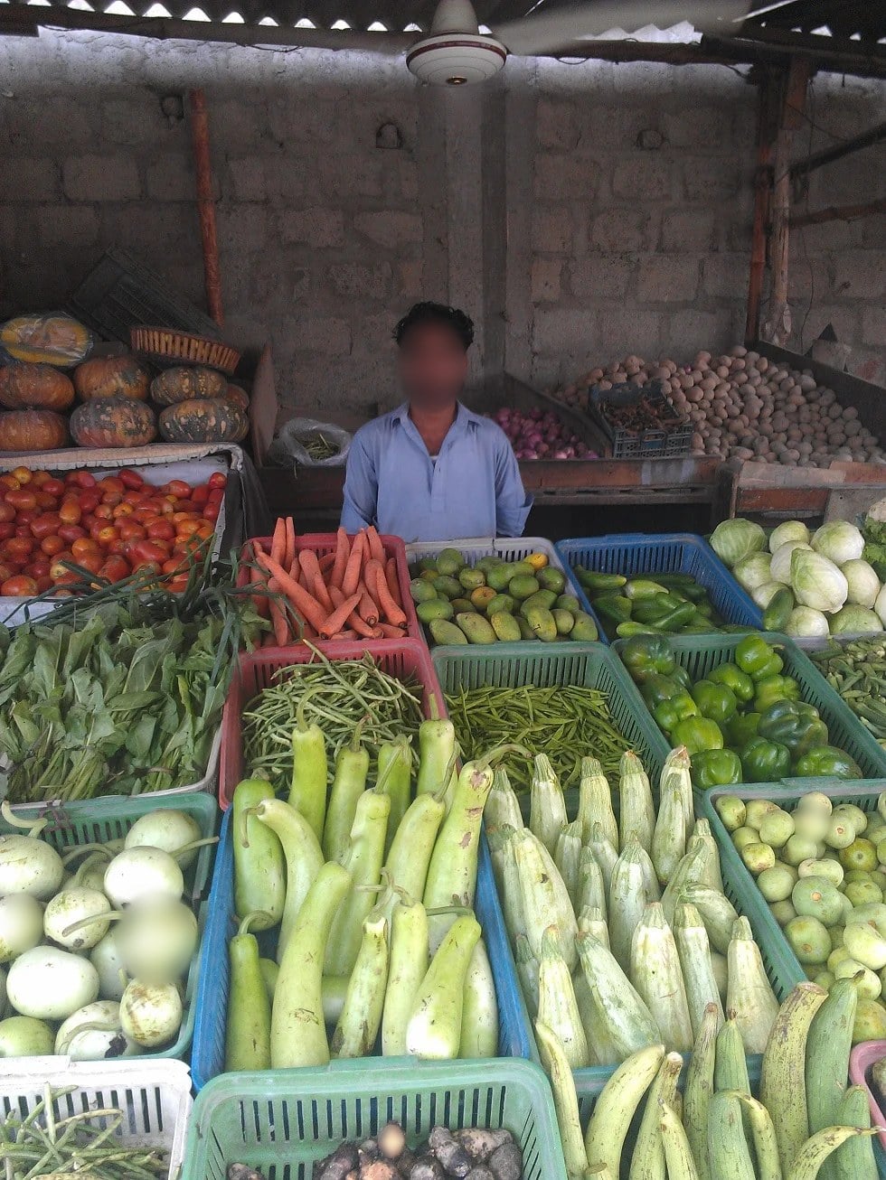 Zeeshan, a mini-MBA participant, at his vegetable stall in Hijrat Colony, Karachi