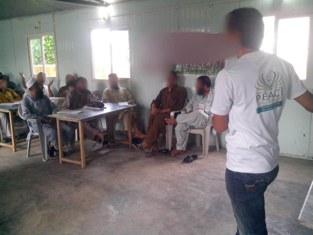 Participants at a Peace Through Prosperity mini-MBA class in Haripur, Khyber Pakhtunkhwa, 2013 (cohort 1, day 4). Faces blurred.
