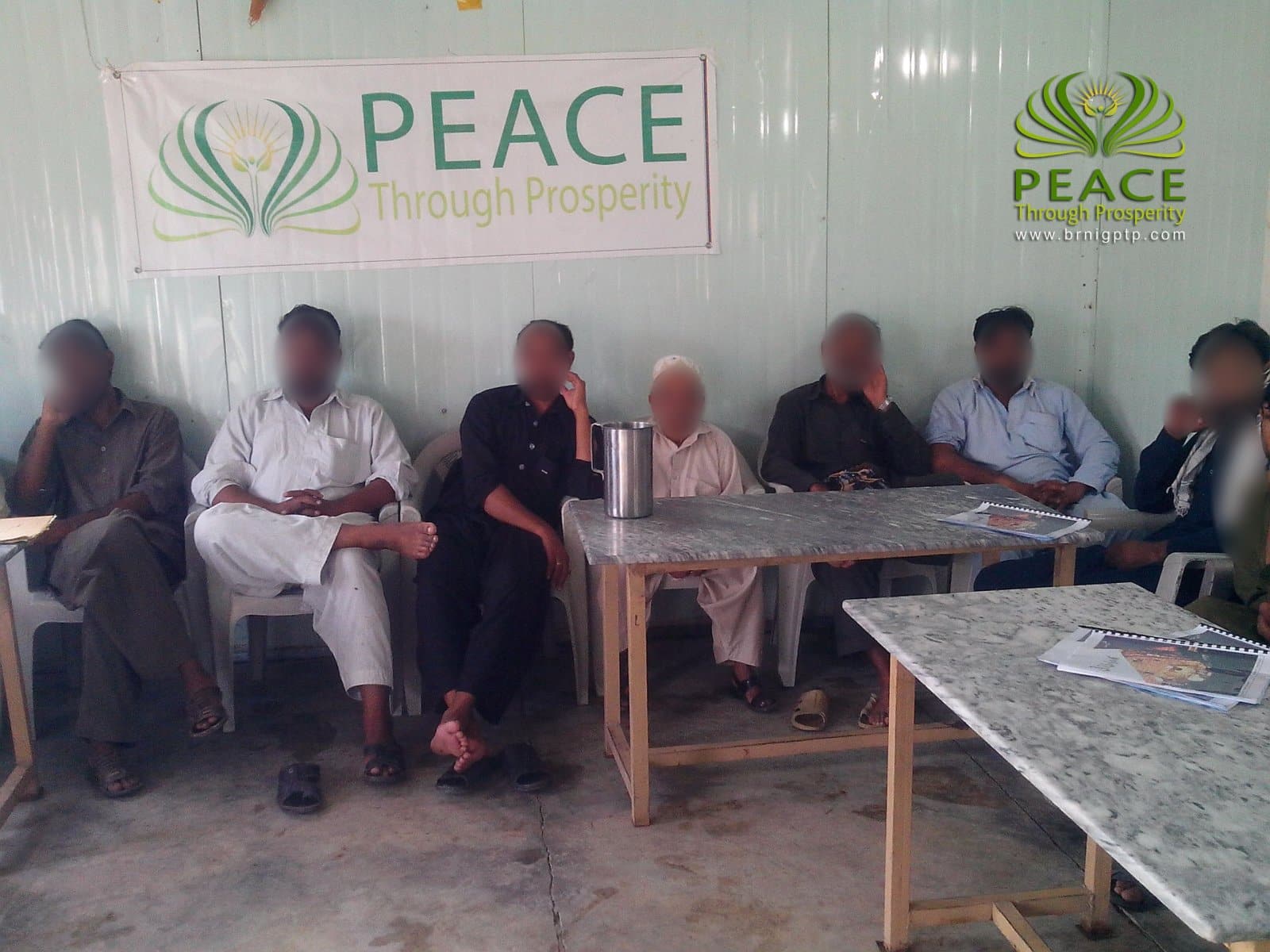 A Peace Through Prosperity mini-MBA class in Haripur, Khyber Pakhtunkhwa, 2013 (cohort 2, day 2). Faces blurred.