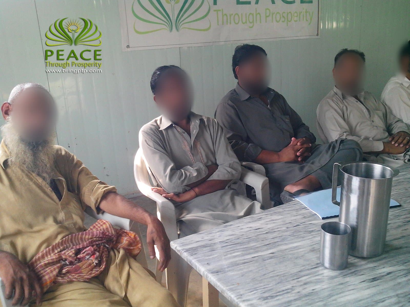 A Peace Through Prosperity mini-MBA class in Haripur, Khyber Pakhtunkhwa, 2013 (cohort 2, day 3). Faces blurred.