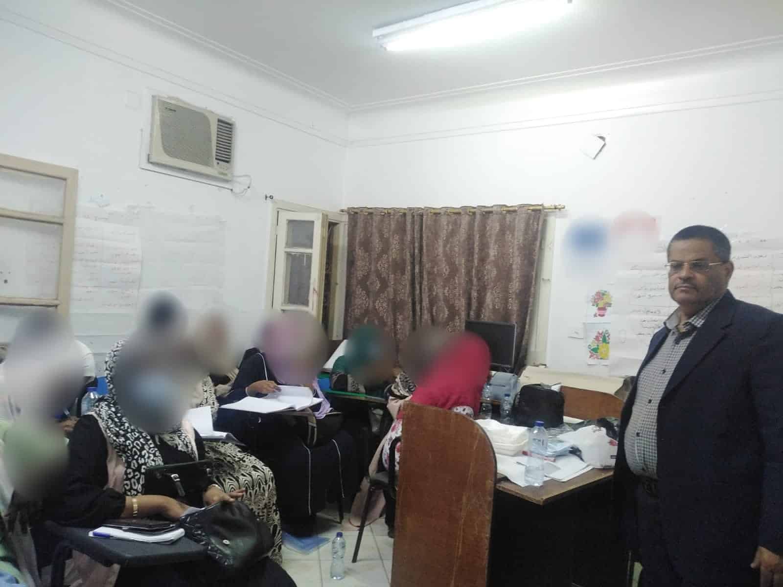 Participants at a mini-MBA workshop in Cairo, September 2024, faces blurred, with a PTP team member at the right